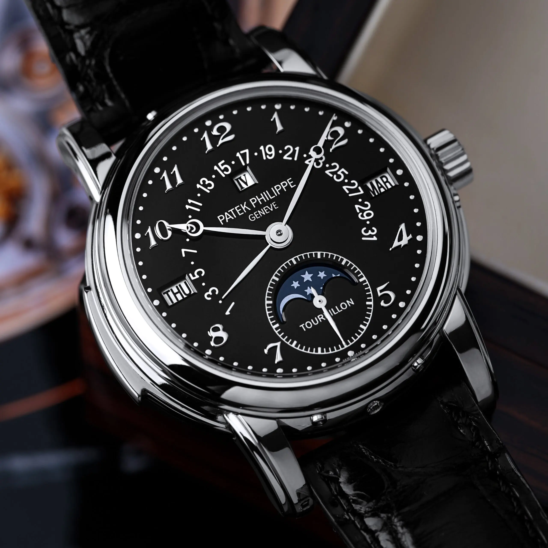 Platinum perpetual calendar wristwatch with a moon phase